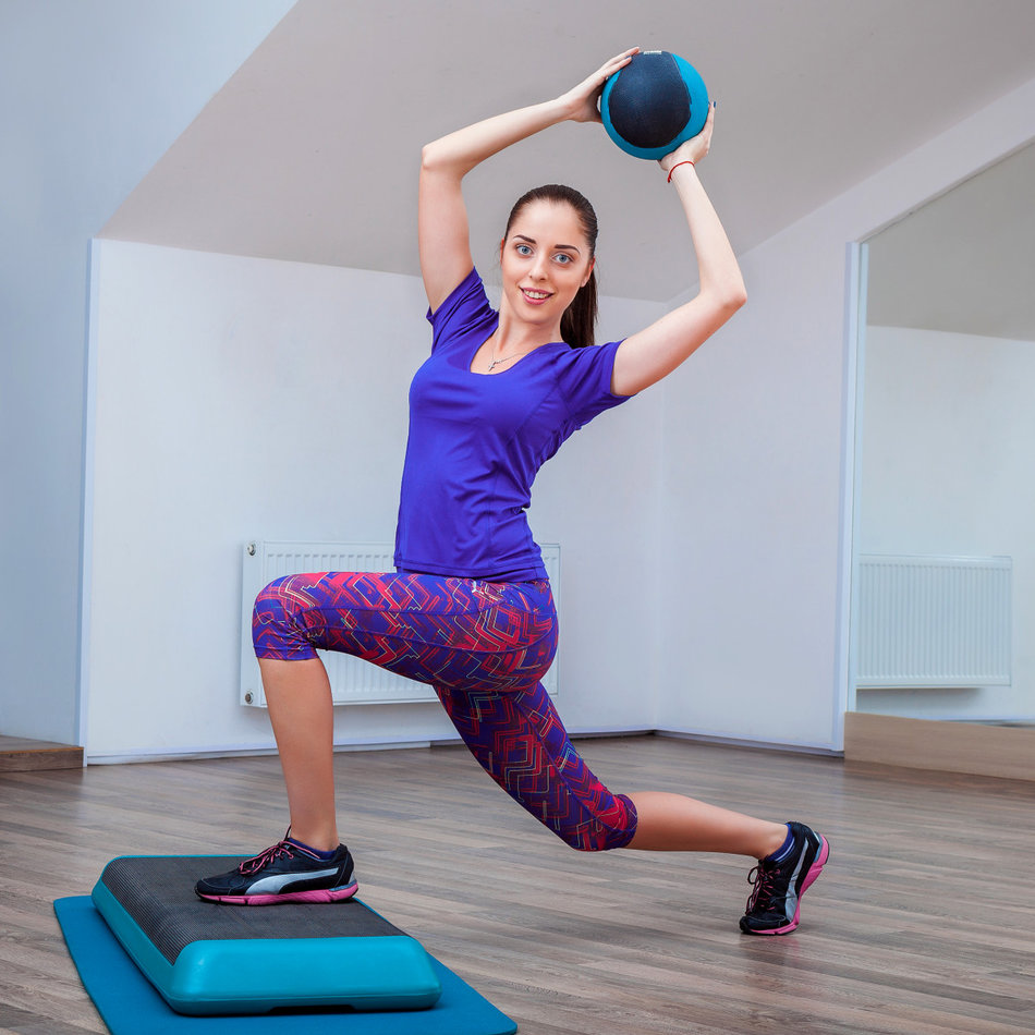 pilates girl all ages posing step board with ball