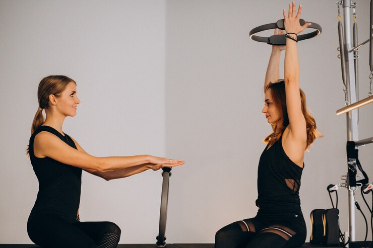 pilates empowering body magic circle focus