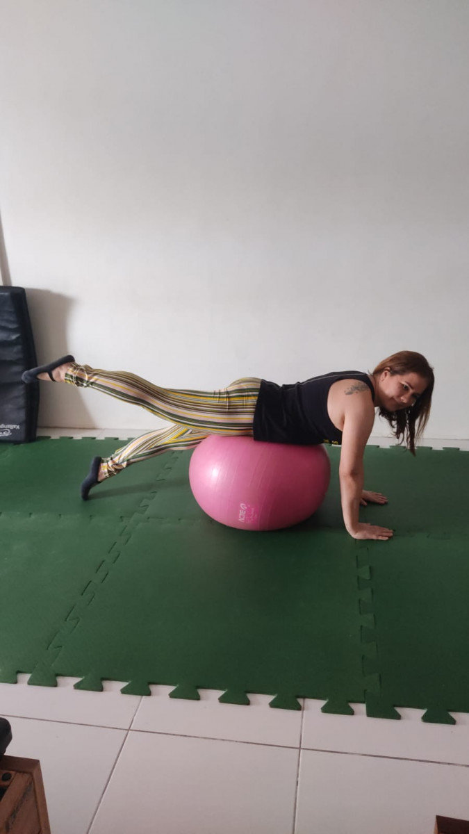 pilates ball mat focus balance woman