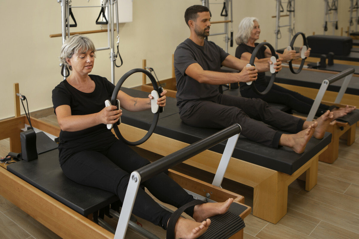 pilates students class focus breathing