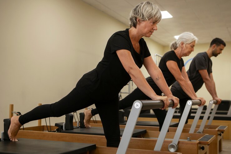 pilates class reformer concentration breathing