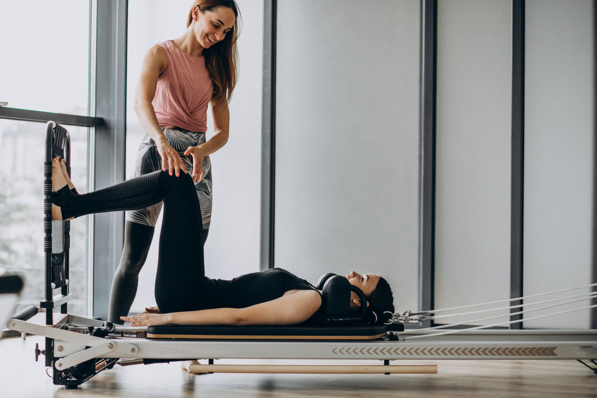 pilates techniques woman training reformer